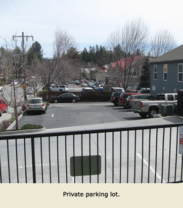 Parking lot for customers of tenants in leased spaces, Grass Valley, CA.